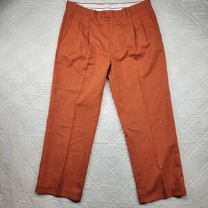 Luxton burnt orange pleated and cuffed dress pants size 36X29